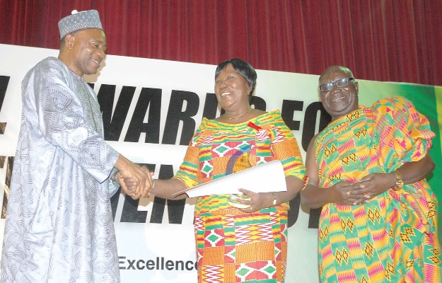 FLASHBACK: Hon Rashid Pelpuo, Minister at the Presidency in-charge  of Public Private Partnership, presenting the Woman Exporter of the Year award to Mrs Juliana Opuni, founder and CEO, Joekopan Enterprise. With them is the husband, Dr Emmanuel Kingsley Opuni. 