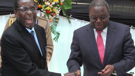 Robert Mugabe (L) and Morgan Tsvangirai (R) both backed the new constitution