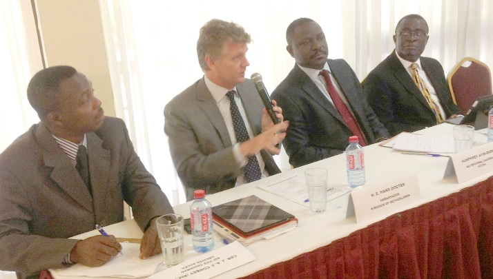 Mr Hans Docter (with microphone), Netherlands Ambassador to Ghana, and some executives of AGI at the workshop in Accra. 