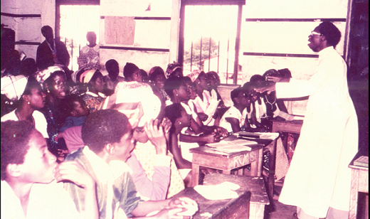 Bro. Pius teaching children the rudiments of singing at Kwahu Tafo.