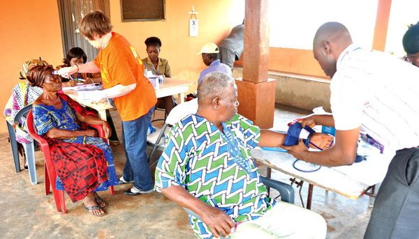 Some aged members of the community being screened by volunteers from the Friends of Africa team.Picture: SAMUEL TEI ADANO