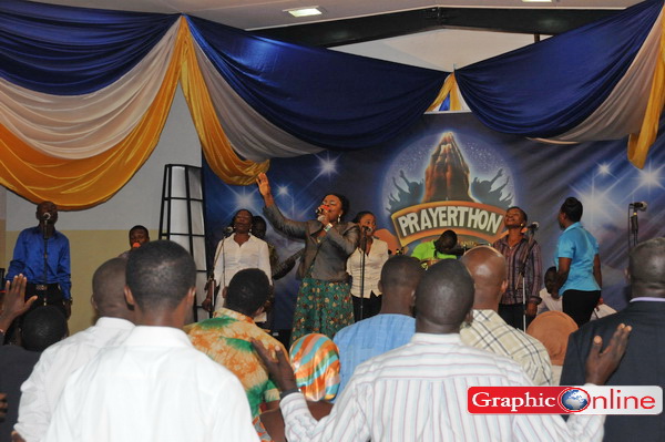 • Participants worshiping God during the Prayerthon all-night service