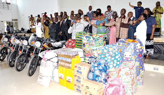 Pastors of the Assemblies of God Church praying to bless the items donated to the Afram Plains communities