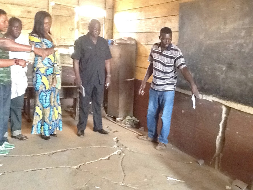 The Deputy Minister, Ms Florence Appoh (3rd right), being shown round the school. With her (2nd right) is Mr Christopher Babooro. 