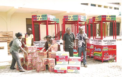  The traffic branded direction stands and some boxes of Indomie Instant Noodles that were presented to the schoolchildren. 