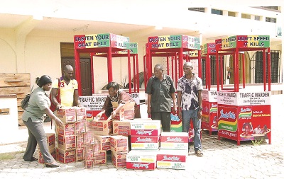  The traffic branded direction stands and some boxes of Indomie Instant Noodles that were presented to the schoolchildren. 
