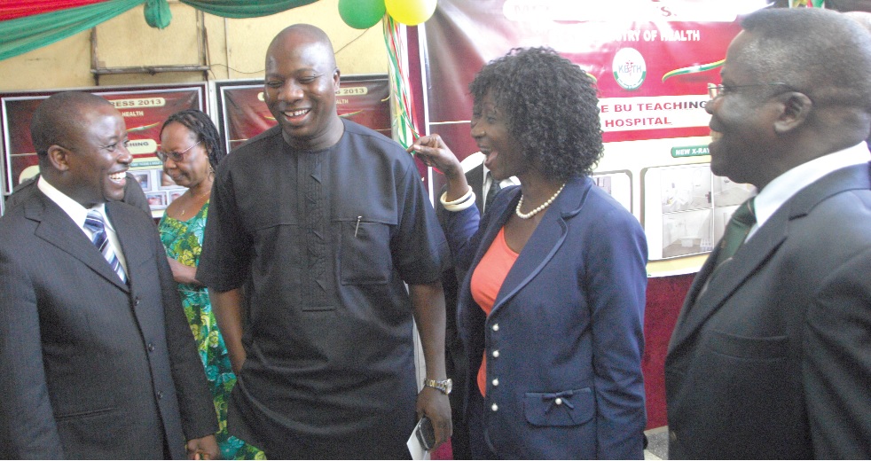 Ms Sherry Ayittey chatting with Mr Mahama  Ayariga (2nd left) at the meet-the-press series at the Ministry of Information in Accra yesterday. Also in the picture are Prof. Ohene Adjei (right), CEO, KATH and Dr Prosper Akanbong, acting CEO of Tamale Teaching Hospital.Accra. 