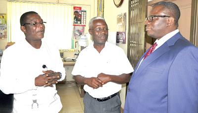 Mr Kingsley Inkoom (middle), Deputy Editor, and Mr Kobby Asmah (left), Political Editor, both of the Daily Graphic, interacting with  Alhaji Amin Sulemani (right), the Minister of Roads & Highways. Picture: NII MARTEY BOTCHWAY