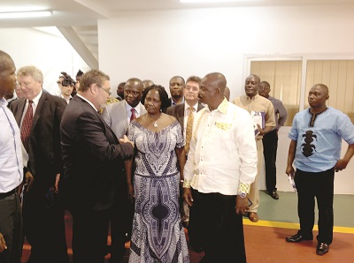 Mr Peter Armstrong (left), an instructor at the centre, briefing the Minister of Education, Professor Naana Jane Opoku-Agyemang (middle), the Deputy Western Regional Minister, Mr Alfred Ekow Gyan (right), and other dignitaries and some officials from the Jubilee Partners.