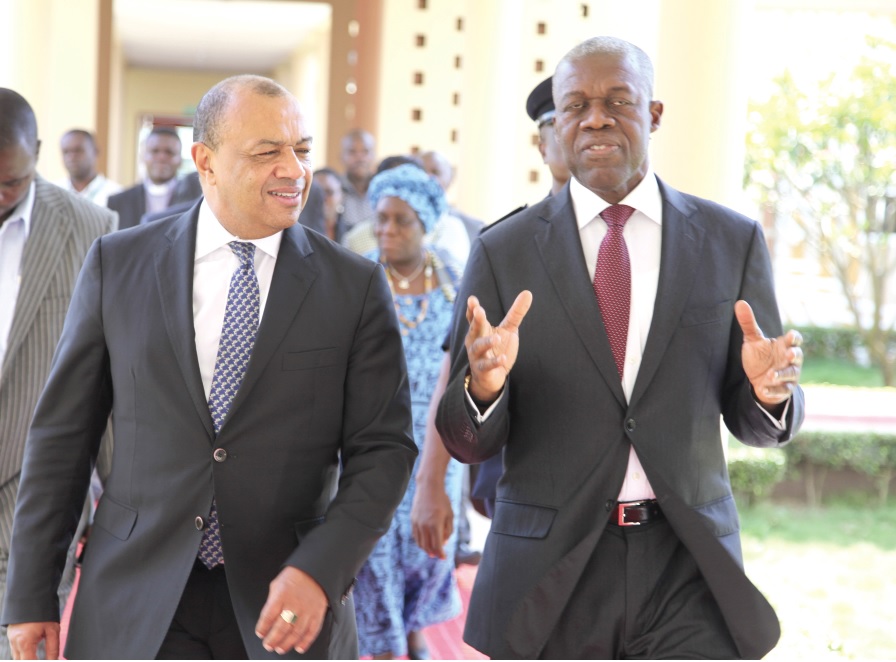 Vice-President Amissah-Arthur interacts with Mr Paul Boateng at the Flagstaff House in Accra.