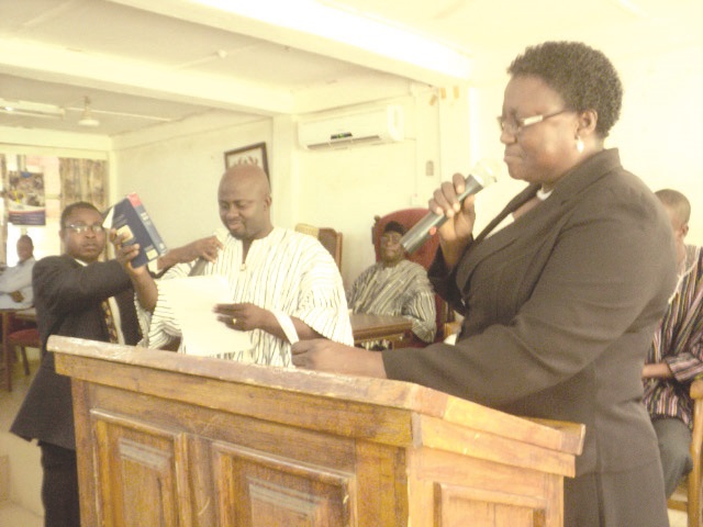 The DCE being sworn in by Madam Vivian Yamusah.