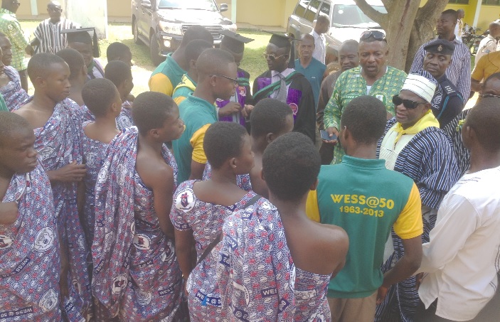 Dr Henry Seidu Danaa (arrowed) interacting with the visually impaired tutors and students of the school.