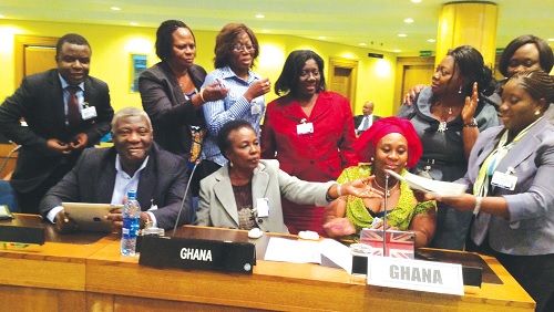 Ghanaian delegates conferring on an issue raised at the conference