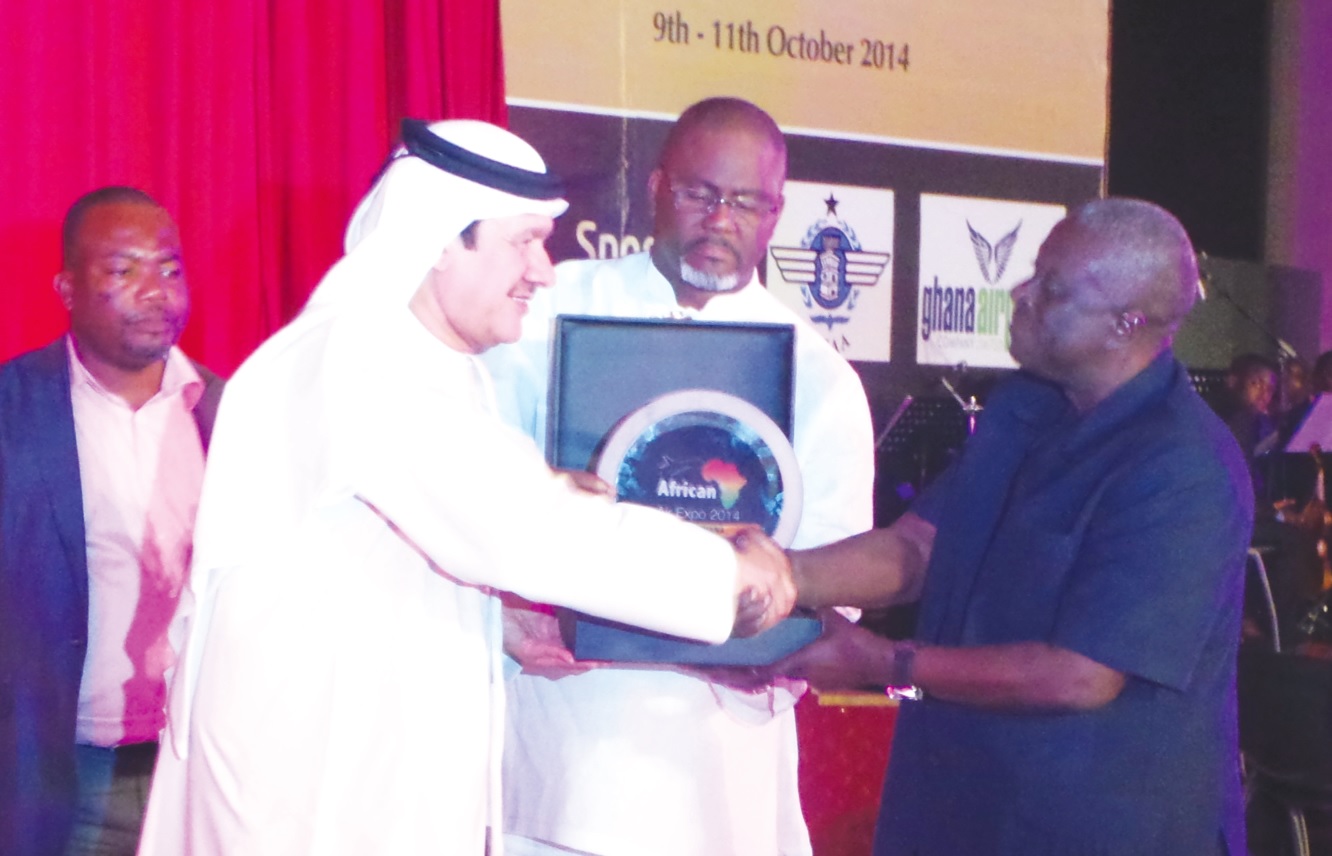 Mr PV Obeng, Special Advisor to President Mahama, receiving an emblem of the aviation expo from Mr. Yousif Hasan Ali Al Hammadi, President of Internal Centre for Excellence (ICE). The emblem was for President Mahama, who is the Chief Patron of the African Air Expo 2014.