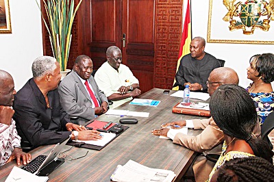  President Mahama at one of his busy sessions last Monday with his team on the performance contract.
