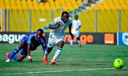 Chelsea's Solomon Asante tears away from his TP Mazembe marker