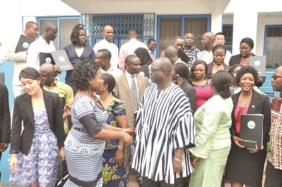 Mrs Dora Dei-Tumi (right), interacting with Mr Alidu Fuseini, Chief Director of the Office of Head of Civil Service. Those with them are some course participants from Ghana, Liberia and Sierra Leone.