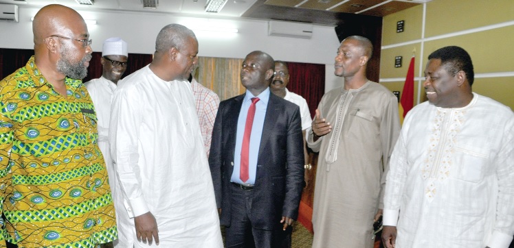 President John Mahama (2nd left), interacting with some of the 2012 presidential candidates. They are: Dr Abu Sakara (right) of the CPP; Mr Jacob Osei Yeboah (2nd right), an independent candidate, Mr Kwaku Addae Odike (3rd right) of UFP and Dr Henry Lartey  of the GCPP. 