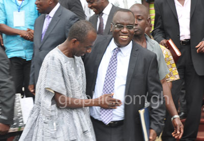 Mr Johnson Asiedu-Nketia (L), General Secretary of the NDC, sharing a joke with Mr Kwadwo Owusu Afriyie (R), General Secretary of NPP
