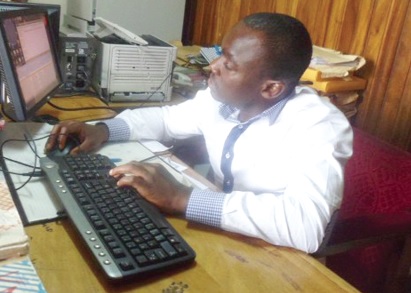 Mr Ralph Adu-Agyapong in his office