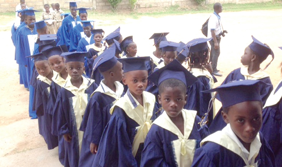 raduands of the  Revival Educational Complex, at Sakaman, processing to the graduation grounds, when the school held its Speech and Prize-giving Day.