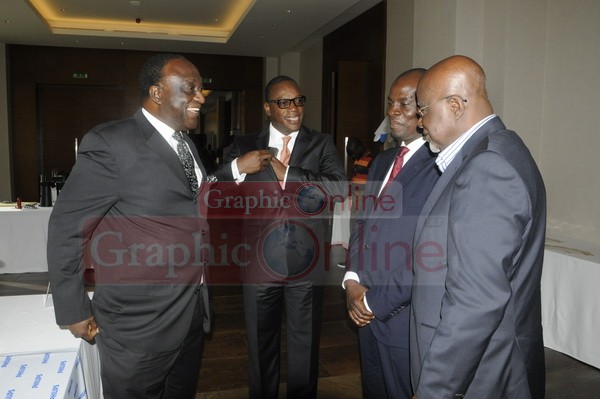  Mr  Alan Kyrematen (left), a former Minister of Trade, interacting with Mr Hackman Owusu Agyemang(right), a former Minister of state, Mr Haruna Iddrissu (2nd right), Minister of Trade and Industries, and Mr Edward Effah, Managing Director of Fidelity Bank, at the Graphic Business-Fidelity Dialogue in Accra.