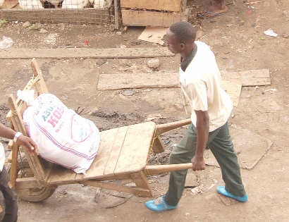 Some of the young men conveying the loads of their customers