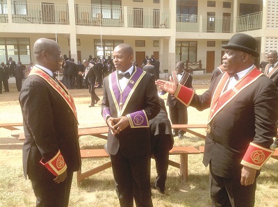  Deputy Supreme Knight, Worthy Bro. Ekow Paintsil  (right) appears to be introducing the new Grand Knight, Bro Philip Mensah (middle) to the Supreme Knight, Sir Knight Derx Baffour (left)