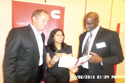 Ms  Ashie Singh (middle), sharing a point with Mr Akunor Azu (right). Looking on is Mr Havenor. Picture: ALIMA AWUDU
