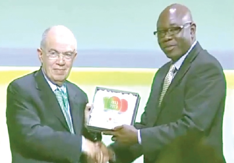 The host of the summit, Mr Fathallah Outlabour, Mayor of Rabat, presenting the plaque to Mr Opong-Fosu