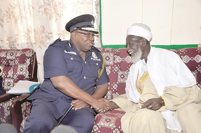 Sheikh Osman Nuhu Sharabutu, the National Chief Imam, interacting with the IGP, Mr Mohammed Ahmed Alhassan.