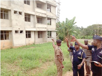 Ninson (second left) and other officials inspecting one of the abandoned projects