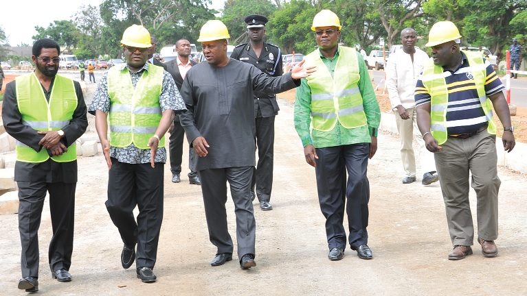 President Mahama inspecting the Burma Camp-37 Military Hospital stretch of road in Accra. With him are from left: Accra mayor Dr Alfred Vanderpuije, Alhaji Awulu Abass, Mr Prosper Bani, Chief of Staff and Mr. Julius Debrah, Greater Accra Regional Minister