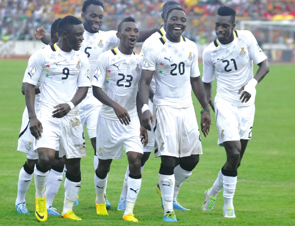 Ecstatic Black Stars players celebrating their second goal against Zambia by Kwadwo Asamoah (2nd right)