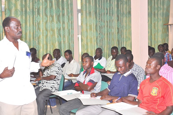 Mr Albert Agyeman Prempeh, addressing the artisans.