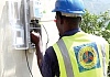 A member of the taskforce deployed by the Electricity Company of Ghana checking out a meter in the ongoing meter authentication exercise