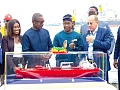Adedeji Odunsi (right), Executive Director of Sahara Group, showing  Dr John Abdulai Jinapor  (2nd from left), the Minister of Energy and Green Transition, a miniature vessel. With them include, Yaa Serwaa Alifo (left), Managing Director of Asharami Ghana