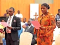 Emelia Afi Agbenyo (right) and Joseph Kwaku Asamoah (left), the two new appointed Deputy Commissioners of the Electoral Commission, taking their oath of office