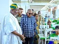 President John Dramani Mahama being conducted around the facility by Alhaji Nurideen Mohammed (left), CEO, Northshore Apparel Hub