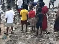 People watched on anxiously as locals organise a rescue effort