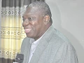 Michael Harry Yamson (left), Administrator of the District Assemblies Common Fund, addressing the meeting