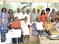 Cameron Duodu (arrowed), surrounded by guests at his 89th birthday celebration