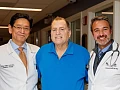 Patient Tim Andrews (centre) with Dr Tatsuo Kawai (left) and Dr Leonardo Riella (right)