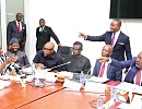 Alexander Afenyo-Markin (right), Minority Leader, and Mahama Ayariga (left), Majority Leader, in a discussion before the vetting of the Supreme Court judge nominees. Picture: ELVIS NII NOI DOWUONA