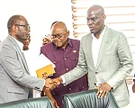 Haruna Iddrisu (right), Minister of Education, in a handshake with Prof. Ernest Kofi Davies (left), Director General, Ghana Education Service, after the meeting with the three-teacher unions. With them is Dr George Smith-Graham (middle), Chief Executive Officer, Fair Wages and Salaries Commission