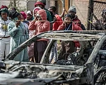 Gunmen torched vehicles as they fled the scene of a mass shooting at bar near Johannesburg