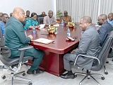 Samuel Okudzeto Ablakwa (left), Minister of Foreign Affairs, and Rev. Dr Stephen Wengam (right), General Superintendent of the Assemblies of God, Ghana, in a chat while their team members look on