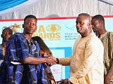 Yakubu Abdul-Majeed (right), the Northern Regional Chairman of the GJA, handing over the Mining and Natural Resources Award to Gilbert Azeem Tiroog, Upper East Regional Correspondent of the Daily Graphic