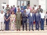 Kenneth Gilbert Adjei (4th from right), Minister of Defence, and Haruna Iddrisu (5th from right), Minister of Education, with the members of the board