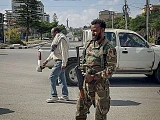 A pro-government soldier standing guard on a street in Ethiopia's Tigray region on Sunday